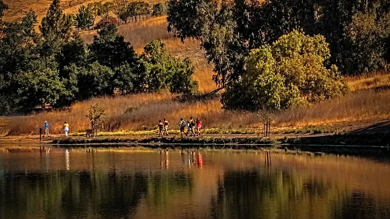Here I'm in Milpitas at a lake, when I looked up and saw a line of people walking. I liked the look, and just had to have a photo.