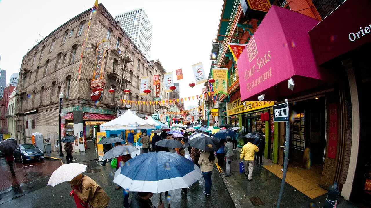 Chinatown, San Francisco. Street view with umbrellas on a rainy day.