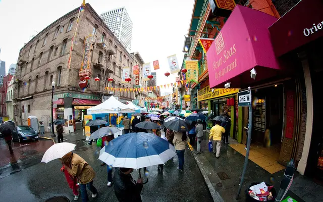 Chinatown, San Francisco. Street view with umbrellas on a rainy day.