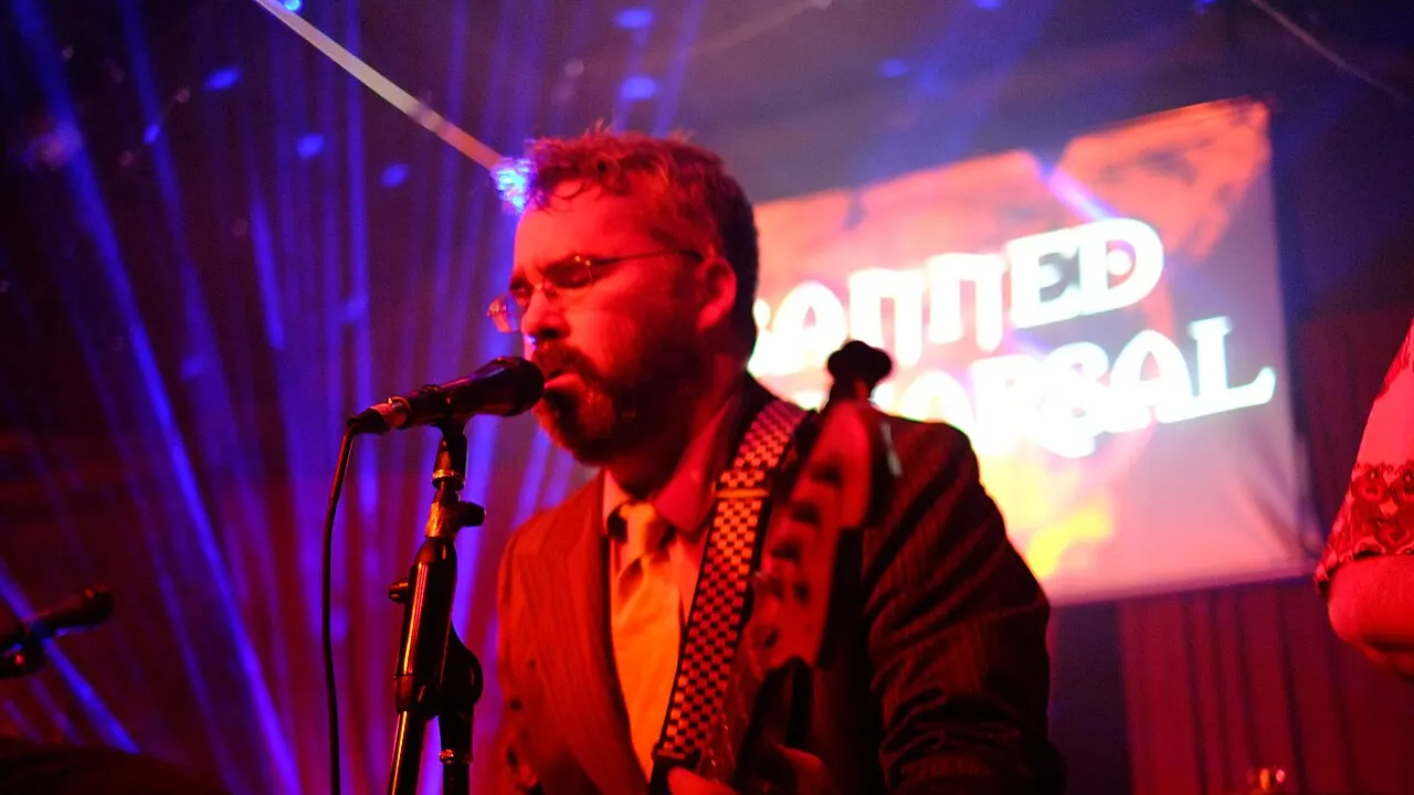 Brian Doherty playing electric bass at the final Brass Tax party at Amnesia (853 Valencia Street), San Francisco, California