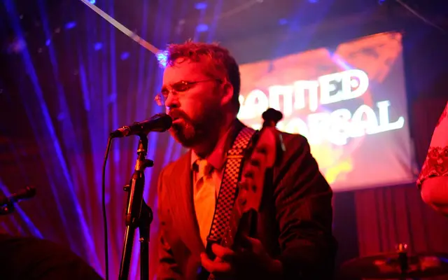 Brian Doherty playing electric bass at the final Brass Tax party at Amnesia (853 Valencia Street), San Francisco, California